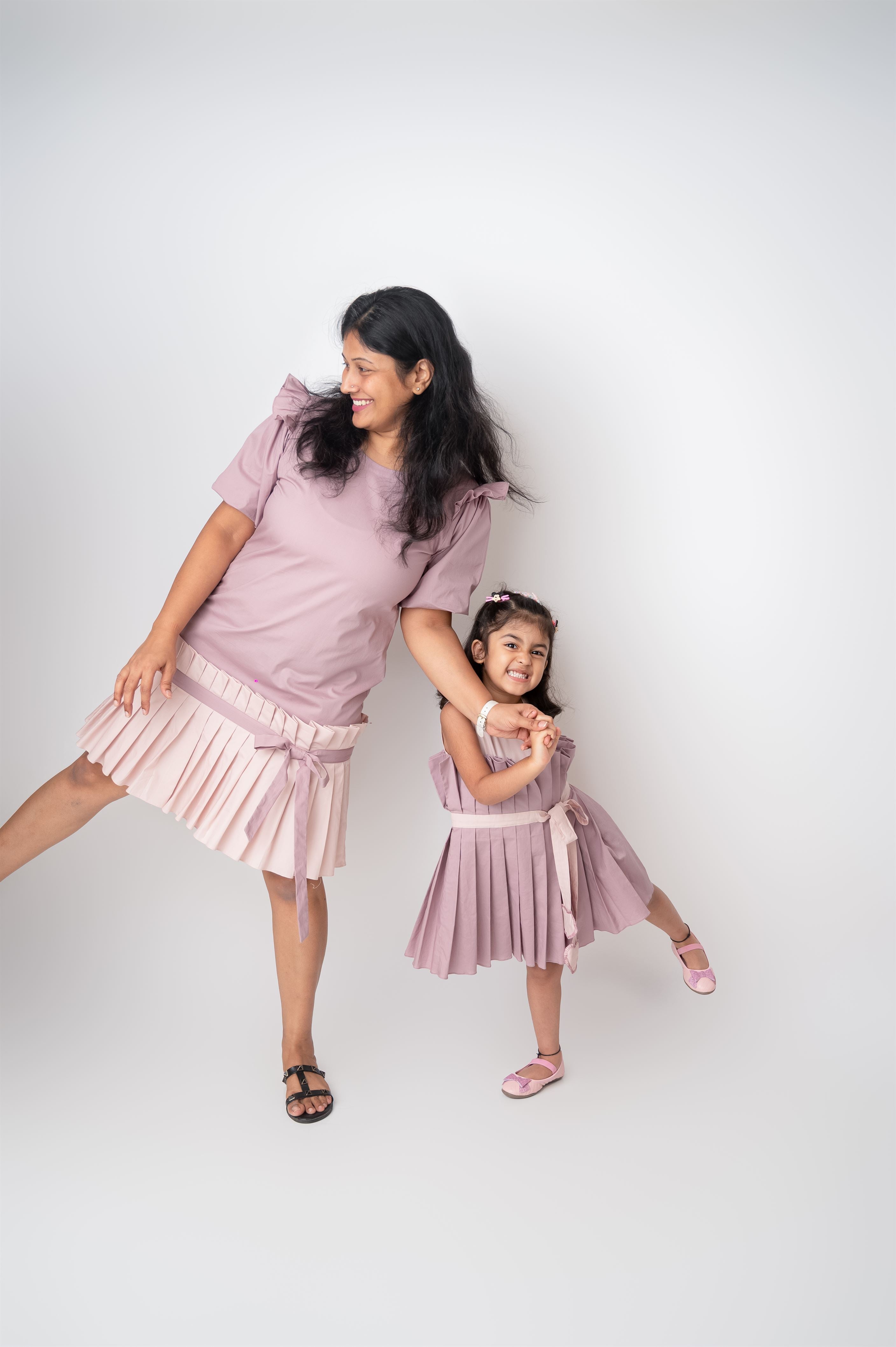 PLEAT ME UP BOW DRESS